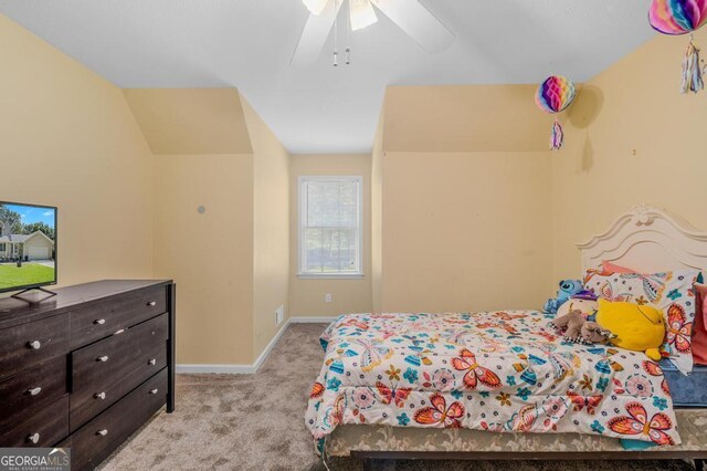 bedroom featuring ceiling fan and light colored carpet