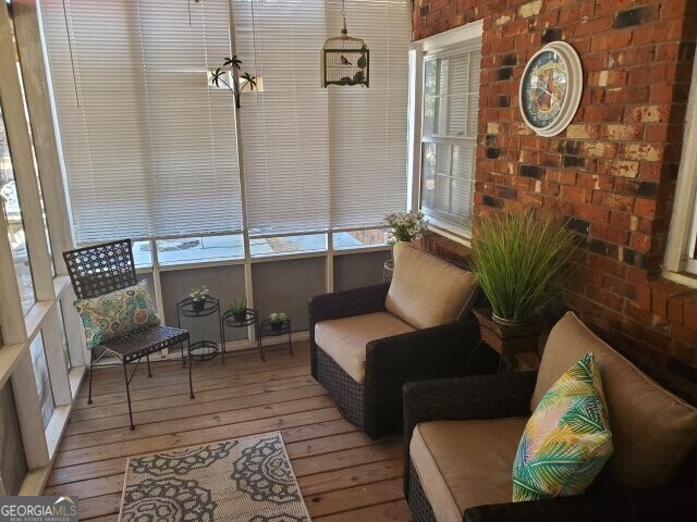 sunroom / solarium with a healthy amount of sunlight