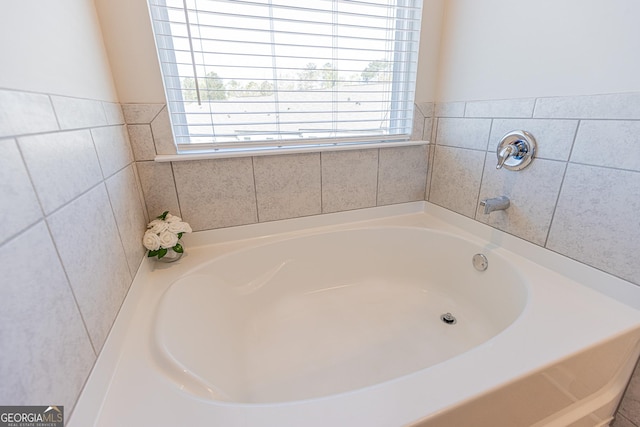 bathroom featuring a bath