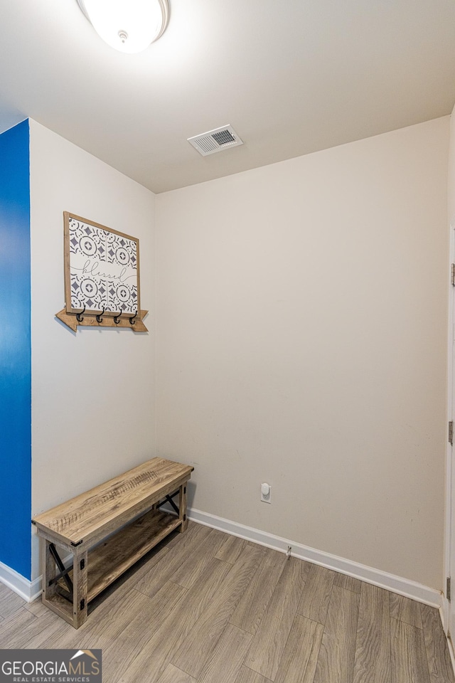 interior space with hardwood / wood-style flooring