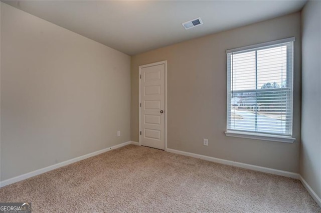 view of carpeted spare room