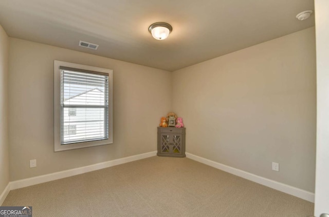 view of carpeted spare room