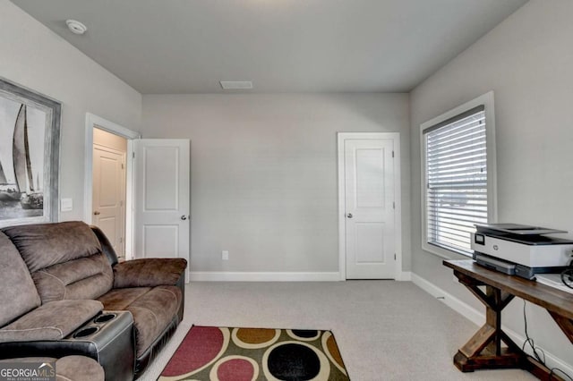 interior space with light colored carpet