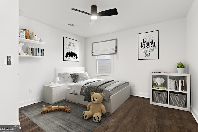 bedroom with dark wood-type flooring and ceiling fan