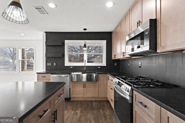 bedroom with dark hardwood / wood-style floors and ceiling fan