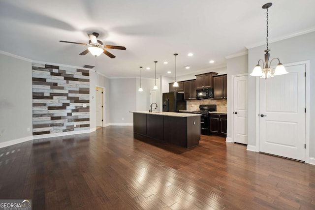 unfurnished room with plenty of natural light, dark wood-type flooring, and a notable chandelier