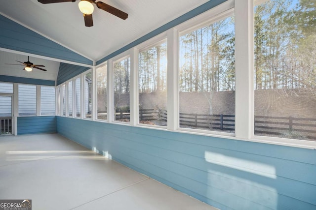 unfurnished sunroom with lofted ceiling