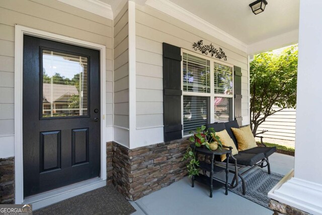 property entrance with a porch