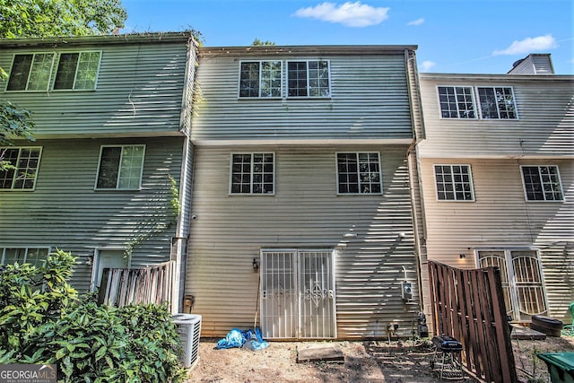 back of property with central air condition unit