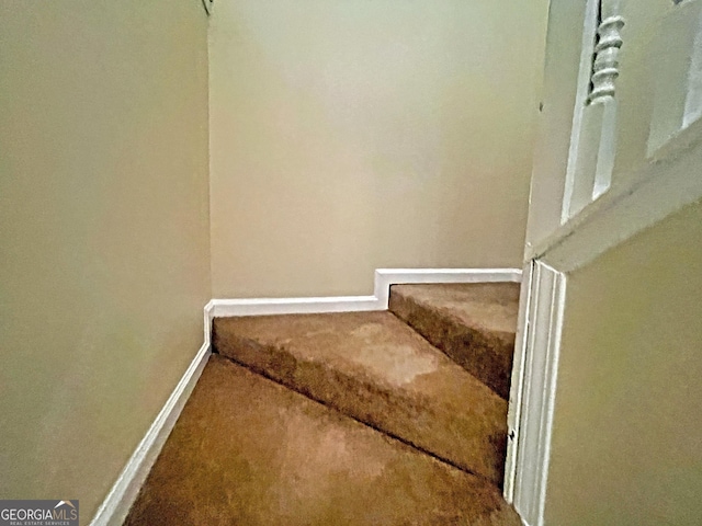 stairs with baseboards