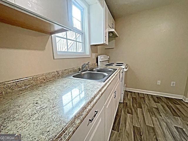 kitchen with electric range, baseboards, dark wood-style floors, white cabinetry, and a sink