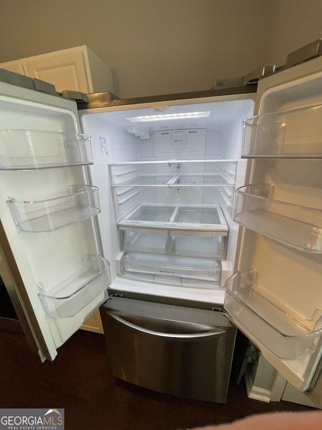 room details featuring refrigerator