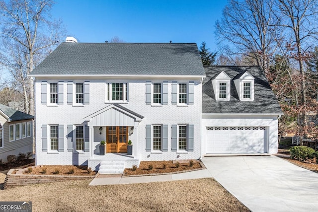 view of front facade with french doors and a garage