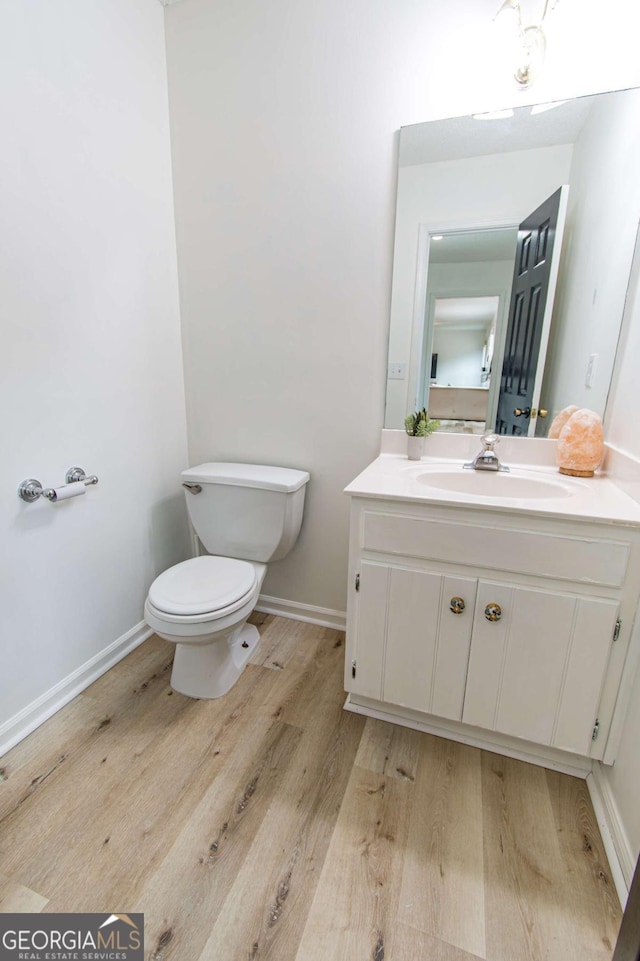 4222 Honey Creek Way, Powder Springs, GA 30127 - bathroom featuring wood finished floors and vanity