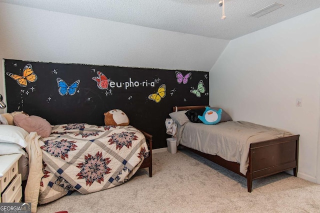 4222 Honey Creek Way, Powder Springs, GA 30127 - bedroom featuring carpet flooring, vaulted ceiling, and a textured ceiling