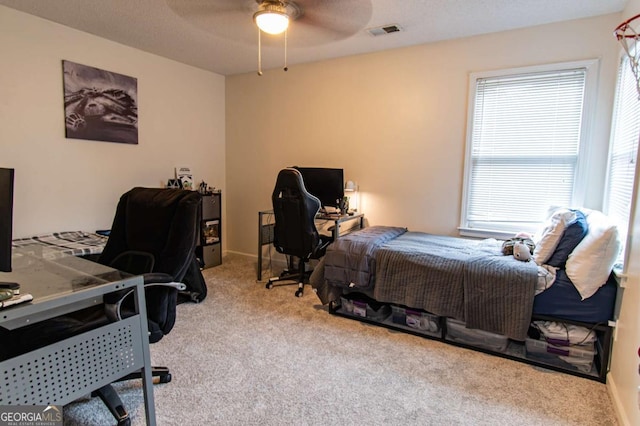 4222 Honey Creek Way, Powder Springs, GA 30127 - carpeted bedroom featuring a desk and ceiling fan