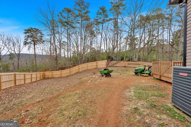 view of yard featuring central AC