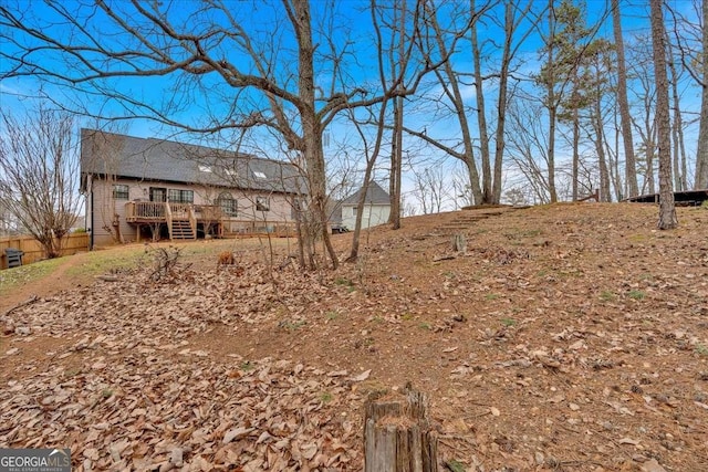 view of yard featuring a deck