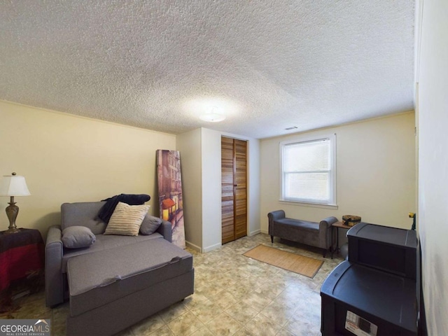 living room featuring a textured ceiling