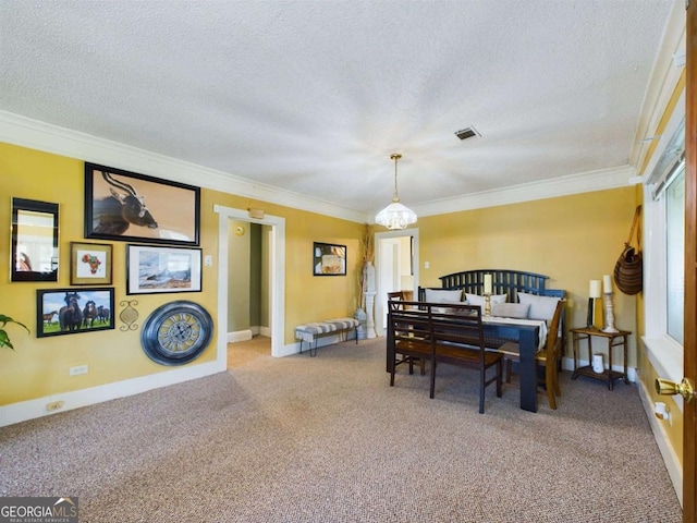 carpeted bedroom with an inviting chandelier, ornamental molding, and a textured ceiling