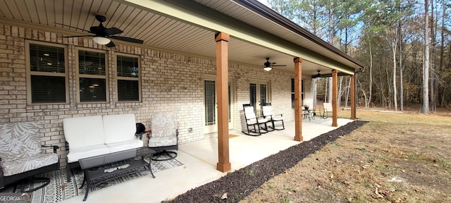 view of patio / terrace featuring an outdoor living space and ceiling fan