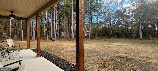 view of yard featuring ceiling fan