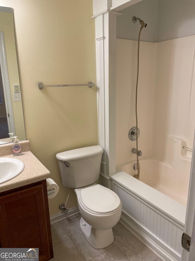 full bathroom with washtub / shower combination, vanity, and toilet