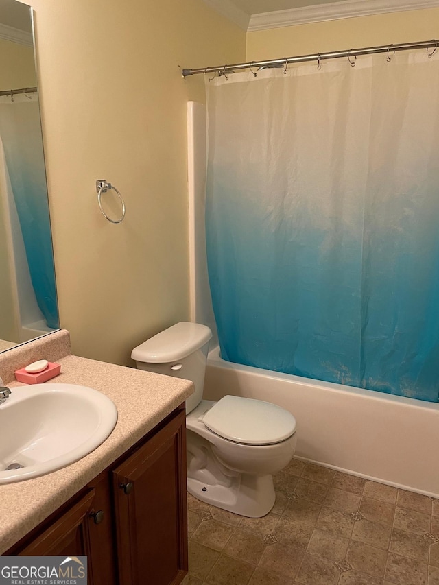 full bathroom with ornamental molding, shower / bath combo, vanity, and toilet