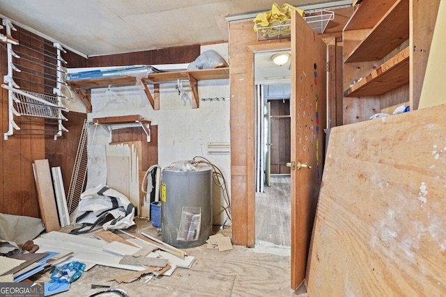 utility room with water heater