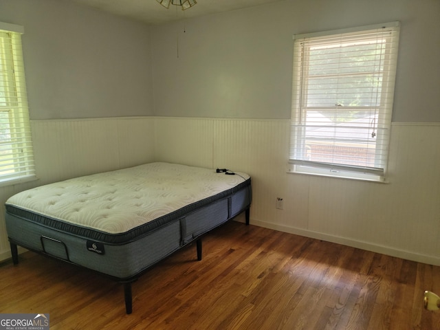 bedroom featuring dark wood-type flooring