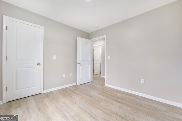 unfurnished bedroom with light hardwood / wood-style flooring