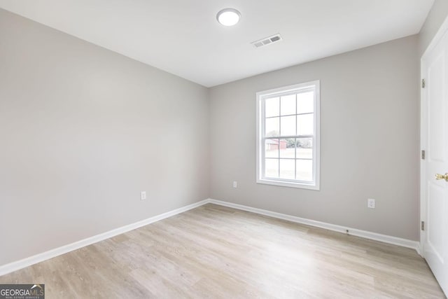 empty room featuring light wood-type flooring