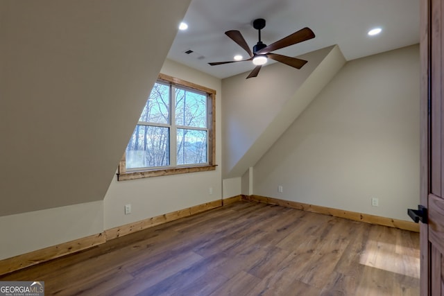 bonus room featuring ceiling fan and wood-type flooring