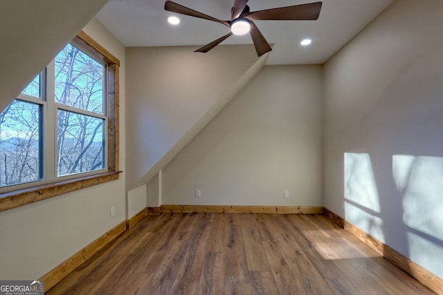 bonus room featuring hardwood / wood-style flooring and ceiling fan