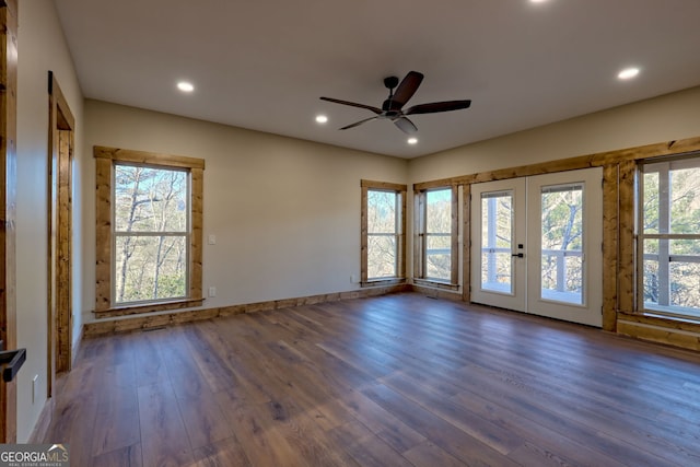 unfurnished room with french doors, ceiling fan, and dark hardwood / wood-style floors