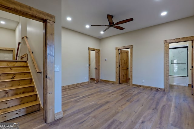 interior space featuring hardwood / wood-style flooring and ceiling fan