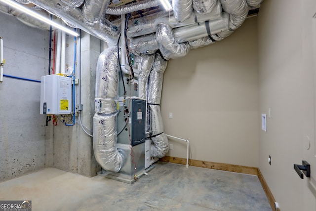 utility room with heating unit and tankless water heater