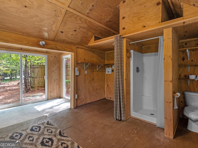 bathroom featuring toilet and a shower