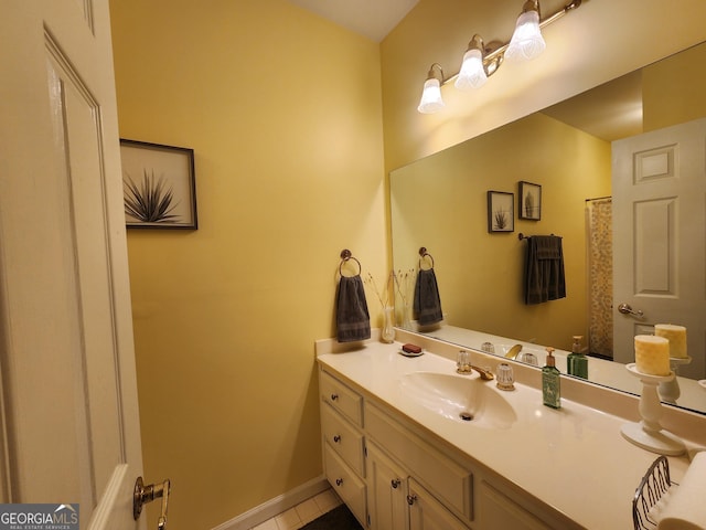 bathroom featuring vanity and tile patterned flooring