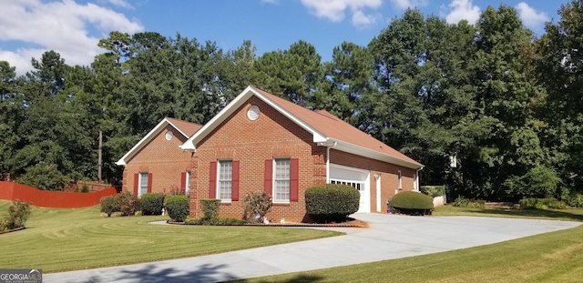 exterior space with a garage and a front yard