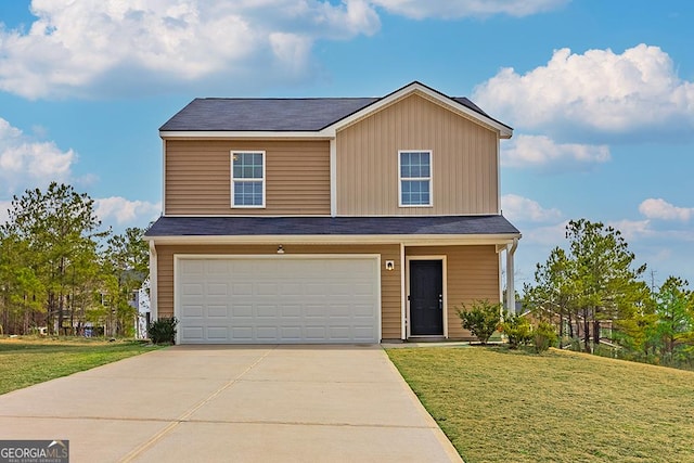 view of front of house featuring a garage and a front lawn