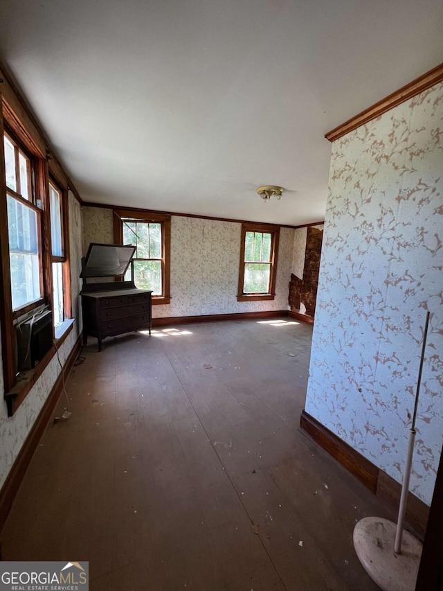 interior space with crown molding and dark hardwood / wood-style floors