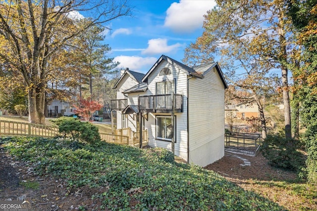 view of property exterior with a balcony