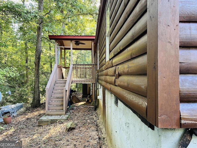 exterior space featuring cooling unit and ceiling fan