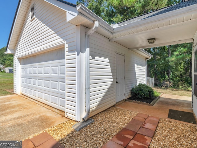 view of property exterior with a garage