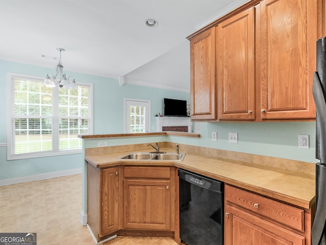 kitchen featuring sink, dishwasher, hanging light fixtures, a notable chandelier, and kitchen peninsula