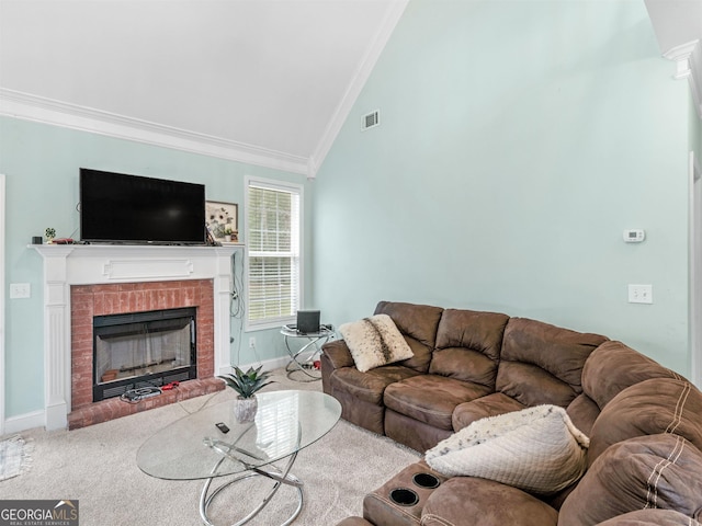 carpeted living room with crown molding, a fireplace, and vaulted ceiling