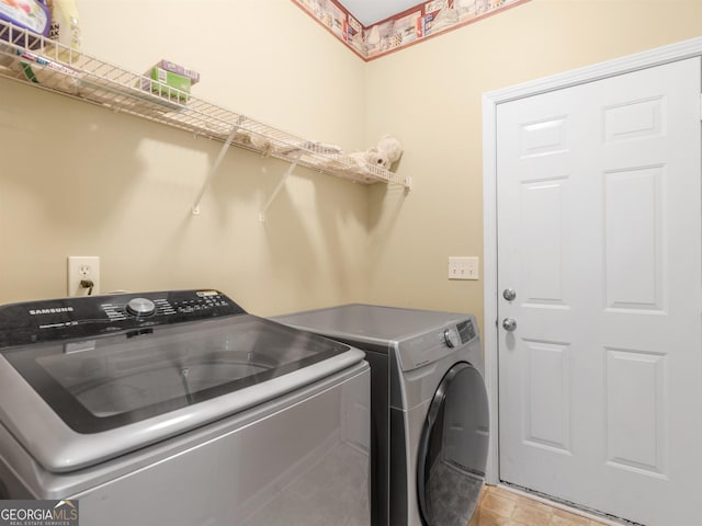 laundry area with washer and dryer