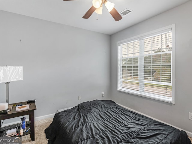 bedroom featuring ceiling fan and carpet flooring