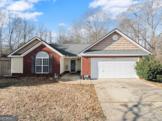 ranch-style home featuring a garage